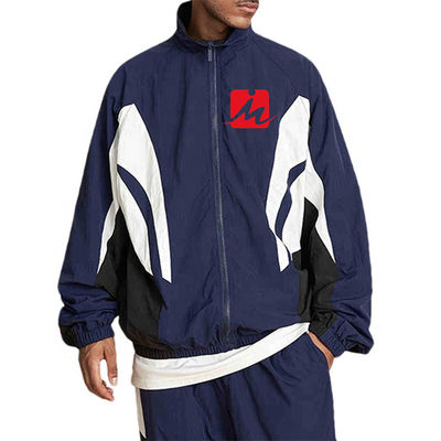 Los hombres impermeabilizan las chaquetas de la cazadora que el poliéster relampaga para arriba la chaqueta de chándal de Colorblock