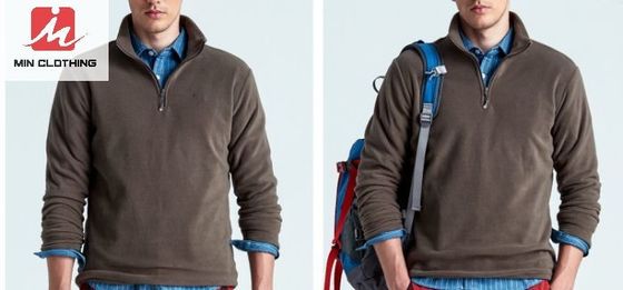 Las chaquetas respirables de la prenda impermeable corriente casual se divierten el poliéster de la cremallera de la mitad de la chaqueta del paño grueso y suave