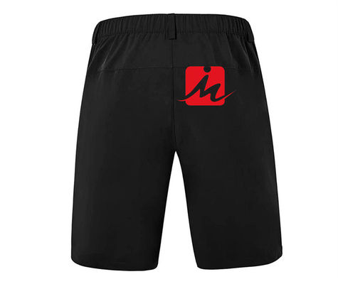 El golf de secado rápido del estiramiento pone en cortocircuito pantalones cortos casuales sólidos del golf de Spandex del poliéster de Wicking de la humedad